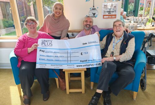 Lister house receiving a cheque to the value of £758